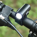 Black USB rechargeable bicycle front light with 350 lumens output.