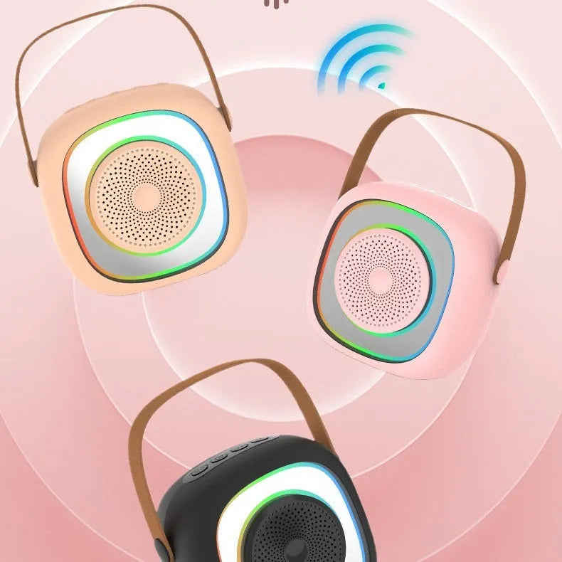 Wireless karaoke microphone in black with wheat detailing showing Bluetooth connectivity and lighting functions