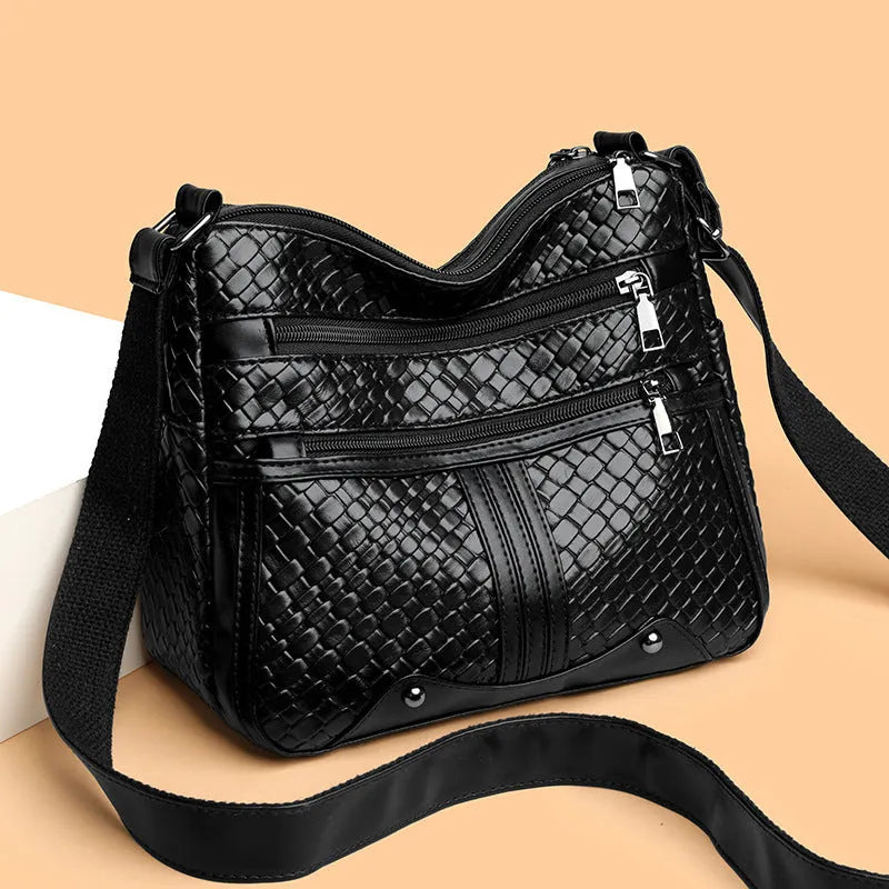 Woven texture messenger bag with multi-compartment internal organisation and single shoulder strap