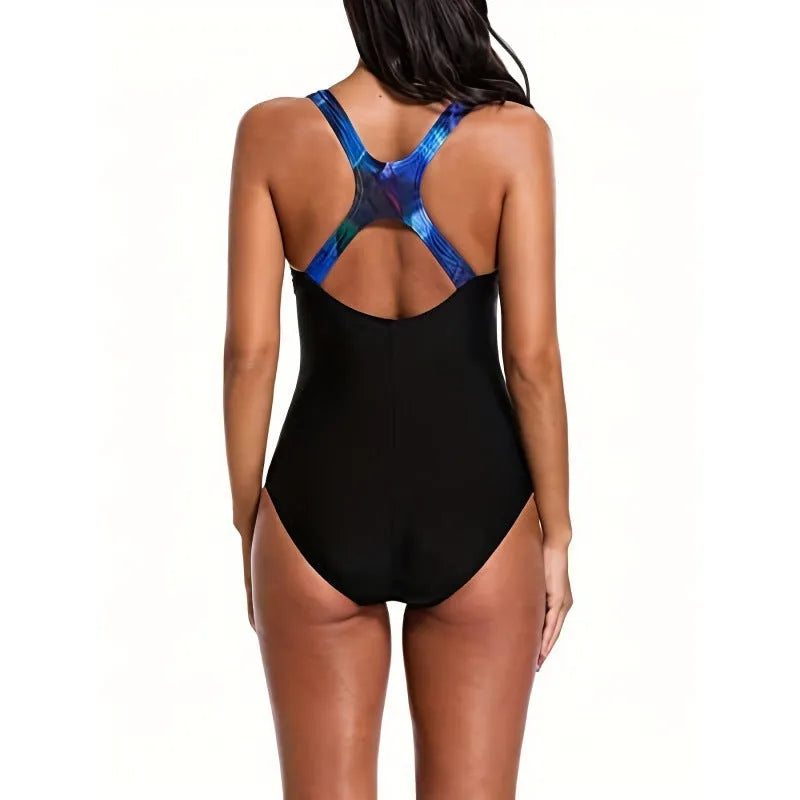 Women's oversized floral printed one-piece swimsuit on a hanger, showing backless design and high-elasticity fabric.