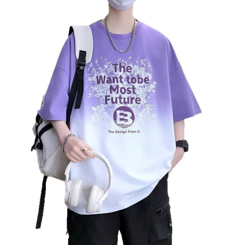 Boy wearing a dark blue youth T-shirt with a printed text pattern and drop-shoulder sleeves