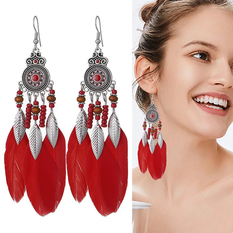 Bohemian style round drop feather earrings with leaf design in alloy, showing electroplated finish.