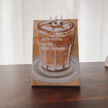 Mini desk calendar 2025 with four themed paper designs including coffee time model