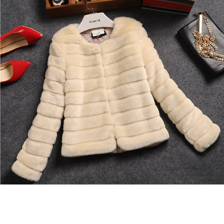 Women's short faux fur top in beige, black, or white, featuring regular sleeves.