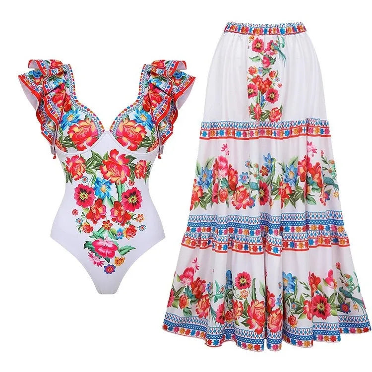 Women's printed one-piece swimsuit in blue, rose pink, white, or red colours.
