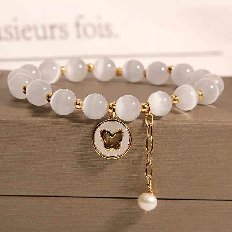 Korean-style white cat's eye crystal bracelet with geometric health care design