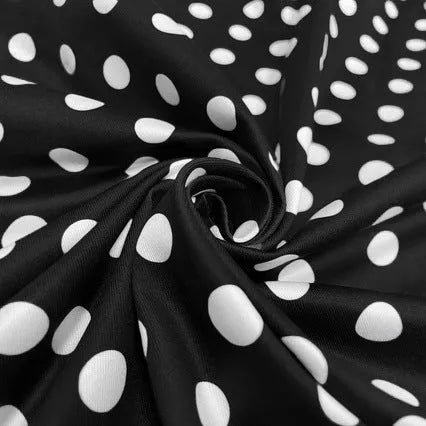 Multicolour polka dot dress with a square neckline, short sleeves, and a full pleated skirt with a back zip.