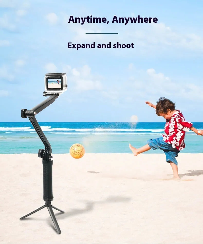 Black folding tripod stand for GoPro Hero action cameras on a flat surface