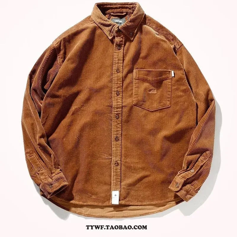 Loose fit caramel corduroy long sleeve shirt with a cardigan style on a hanger.