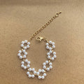 Pearl necklace and bracelet set for women on white background