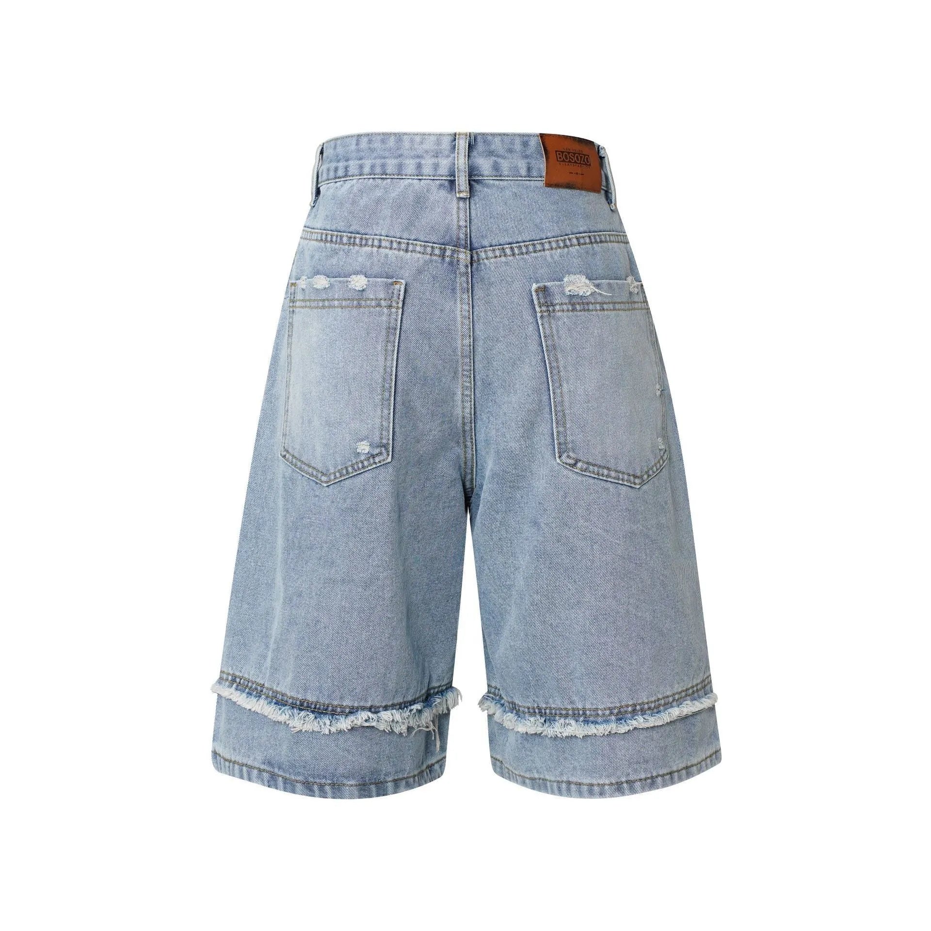 Distressed denim shorts with raw edge hemming in straight leg cut, available in three colour options