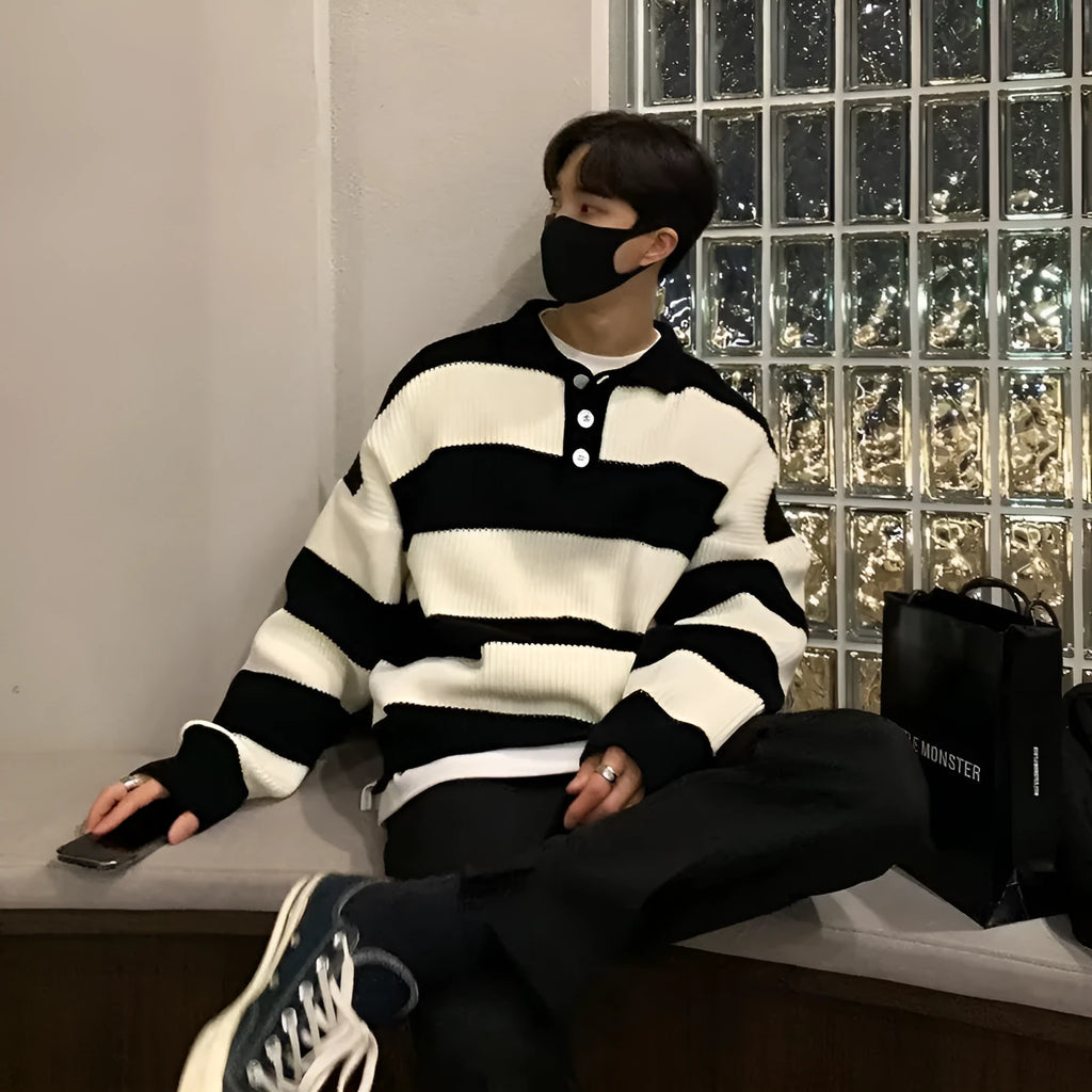 Men's loose fit black and grey striped sweater coat with long sleeves and pullover design