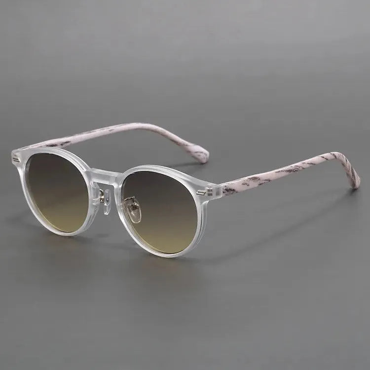 Retro frosted round rim sunglasses with patterned lenses in sand white frame and grey yellow lenses.