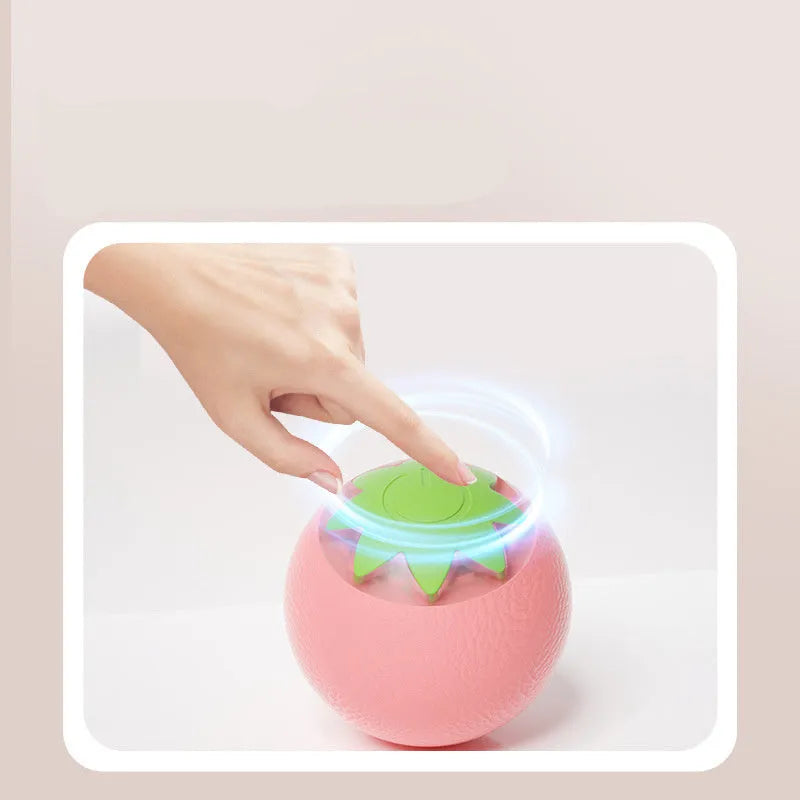 Green automatic rolling ball pet toy for cats and dogs measuring 4.5cm cube