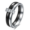 Glossy black ceramic women's ring with round inlaid detail on a 6mm wide geometric band.
