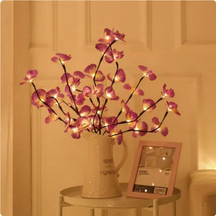 Pink phalaenopsis orchid branch LED light with fabric shade on a wooden surface, measuring 65cm long.