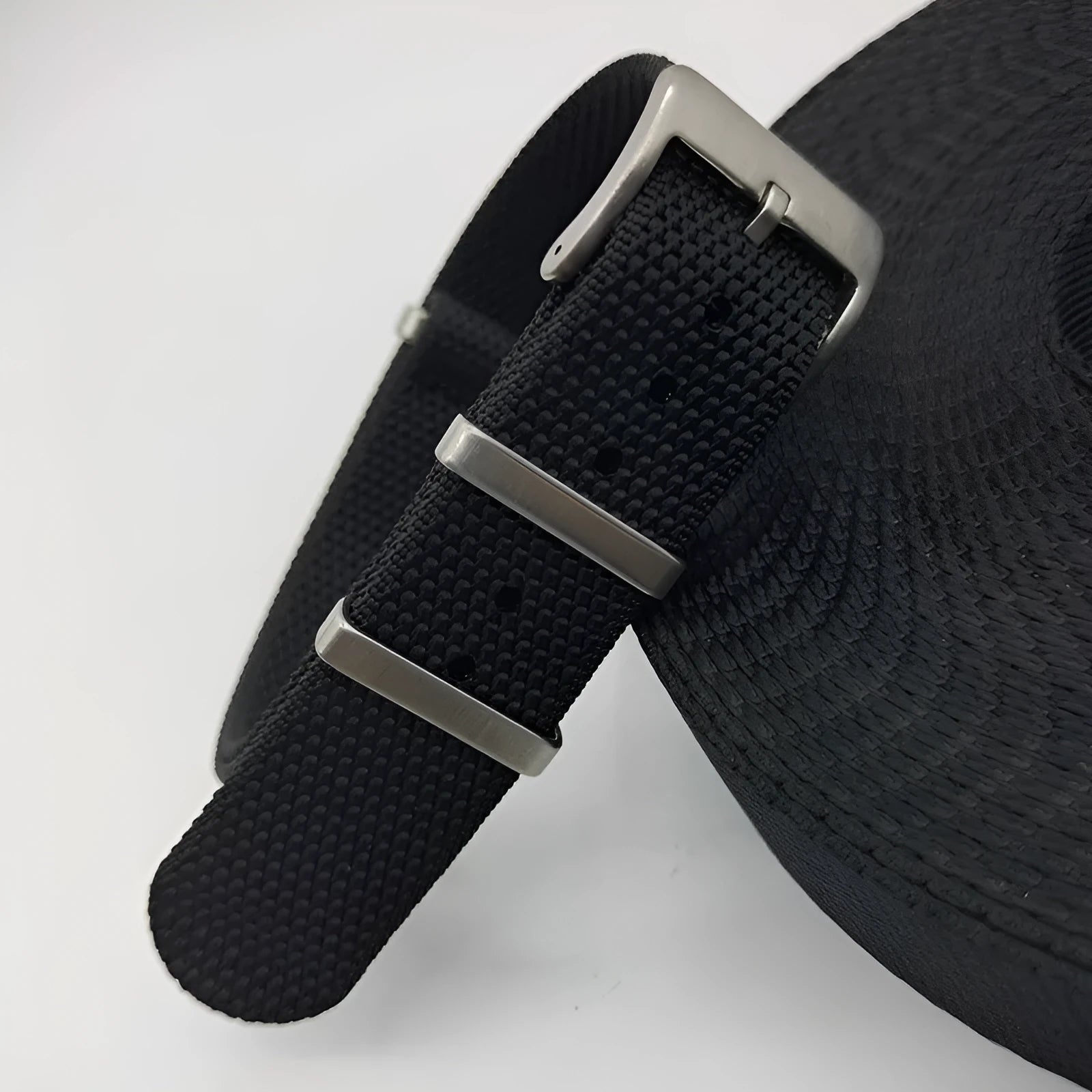 Nylon integrated watch strap in army green colour, showing the 20mm width option.