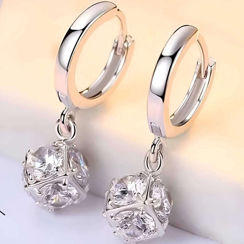 Geometric rose design women's electroplated copper earrings shown in one of the available colour variants.