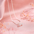 Silver cherry pendant necklace on a snake bones chain, adjustable from 21cm to 50cm length.