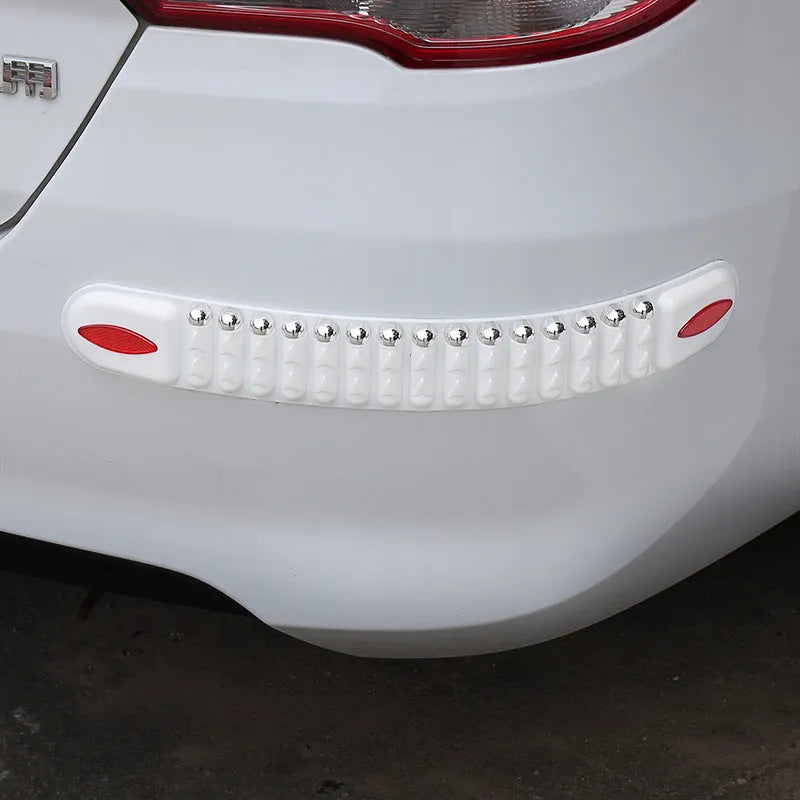 Set of four widened thickened PVC car bumper strips in black with stick-on backing for vehicle bumper protection