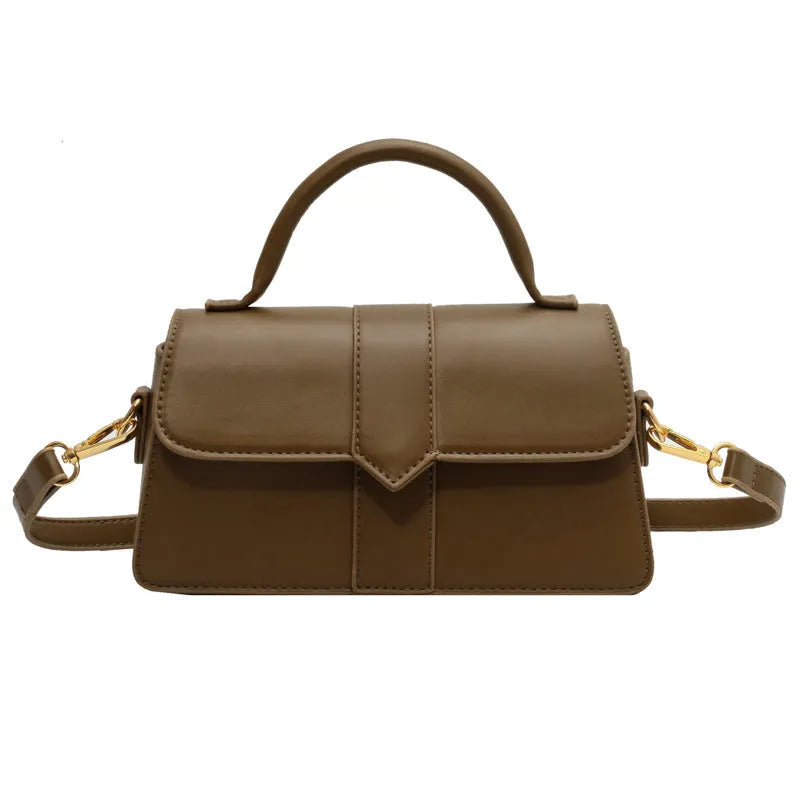 Women's beige messenger bag showing file compartment and sandwich pocket exterior