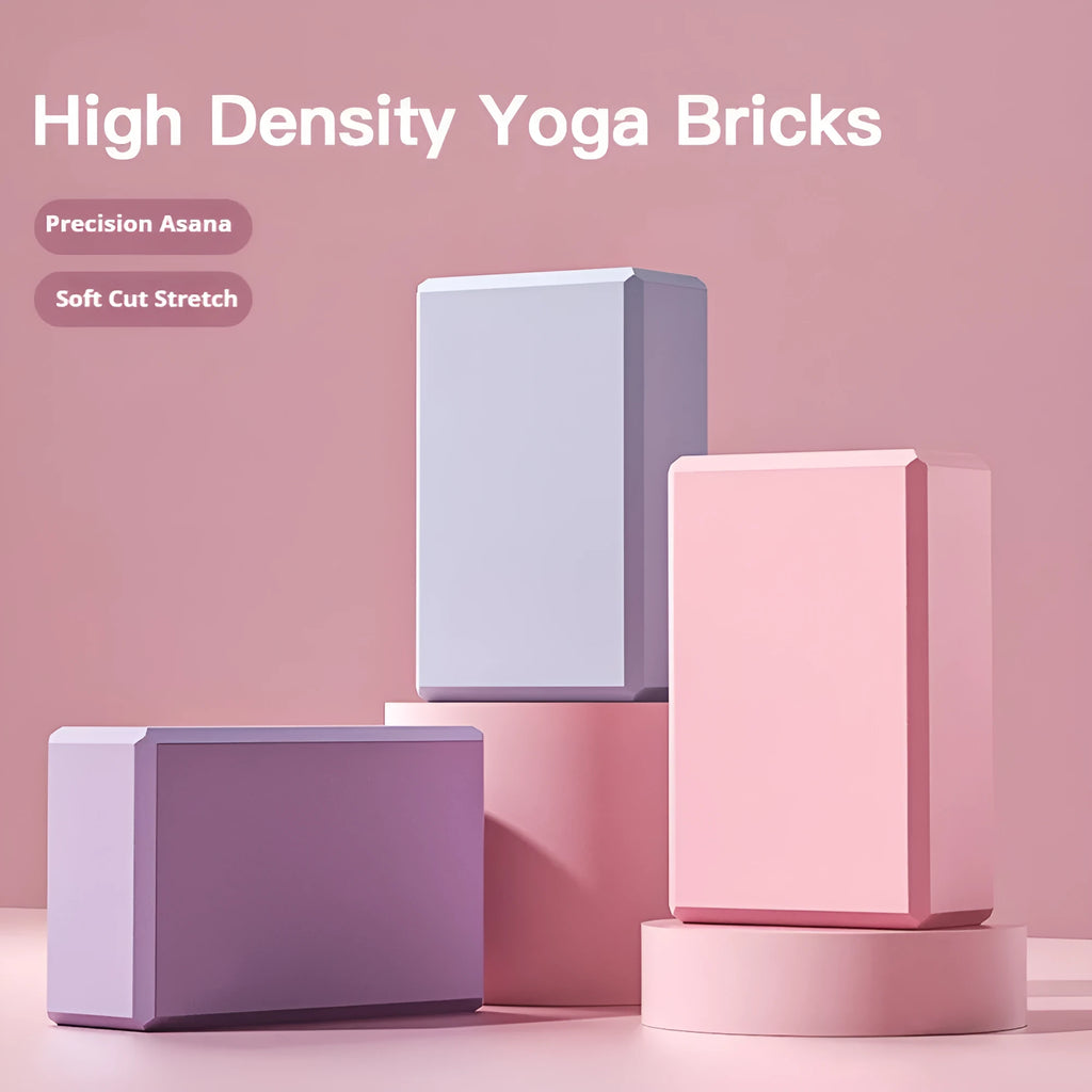 Solid blue EVA foam yoga brick with ridged hexagonal surface, shown next to a pink block.