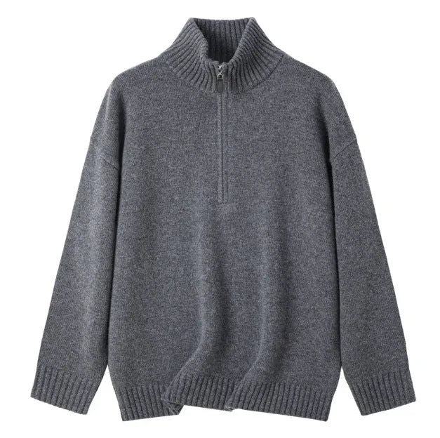 A woman's loose lapels bandage dress in wool, shown in black and grey, with long sleeves.