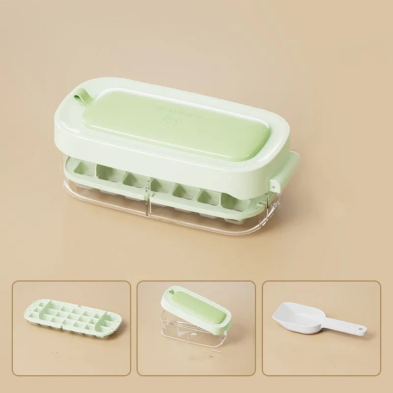 A high-capacity blue ice cube tray with a leverage-action lid and a stored ice shovel.