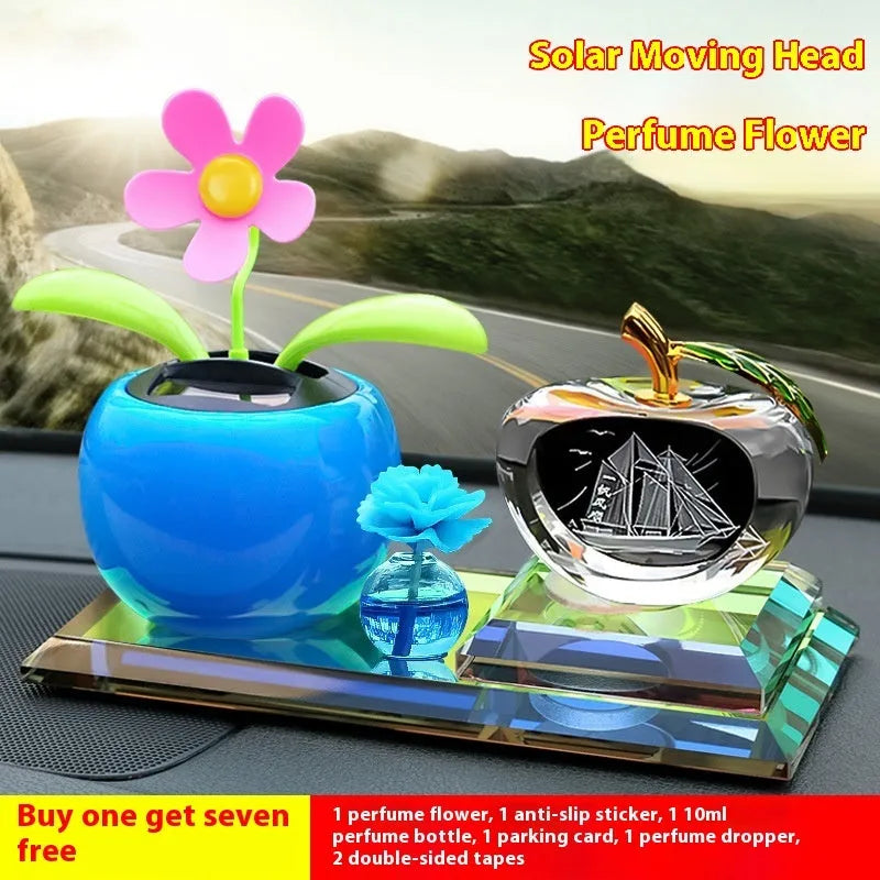 Glass car perfume ornament with crystal carving, cartoon style, in blue or red, including clock, apple, and shaking head monk designs.