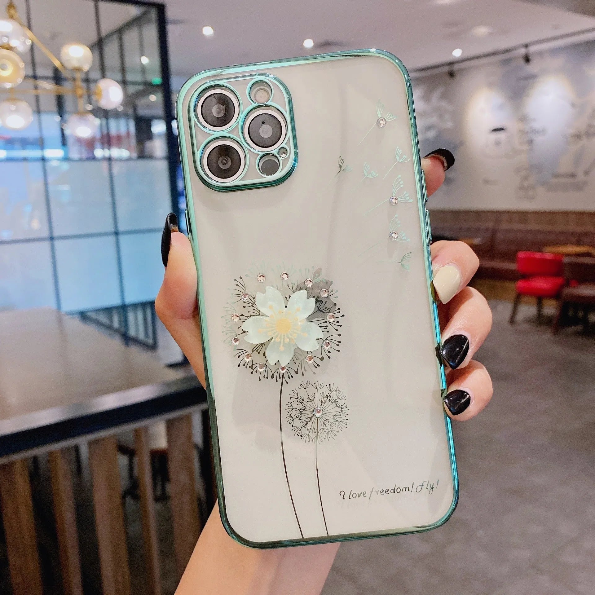 Green 3D floral design iPhone case with a rotating kickstand extended, showing the integrated screen protector.