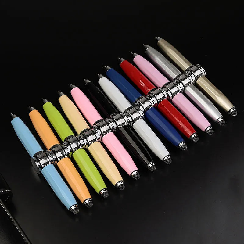Metal LED light-up gyro spinner ballpoint pen showing 12 ink colour options
