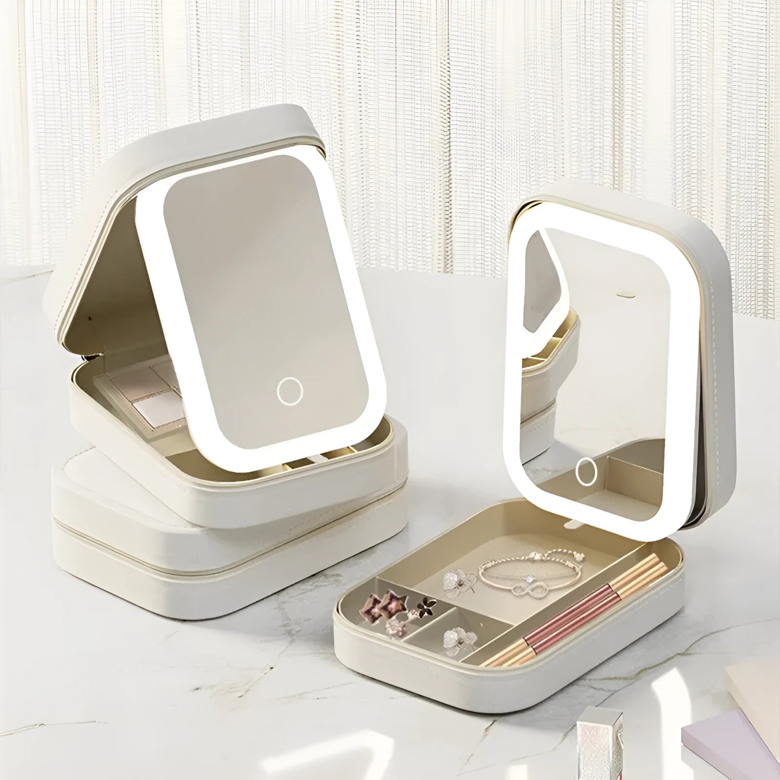 Pink portable makeup storage box with built-in LED light mirror and touch control, showing cosmetic storage compartment.