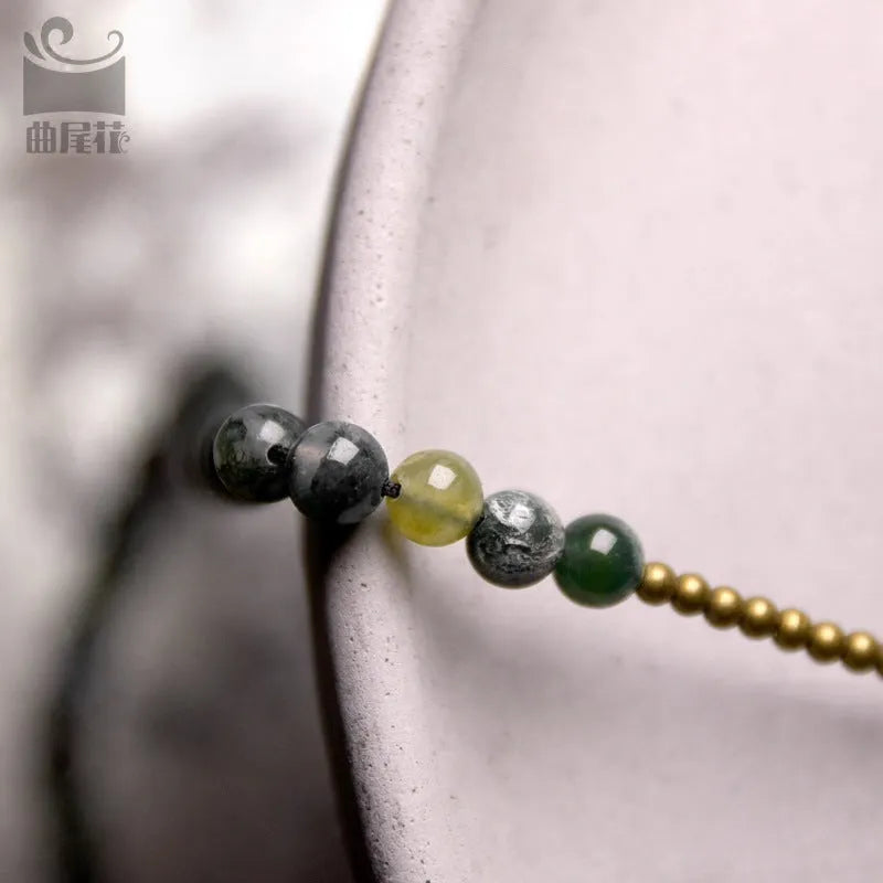 Handcrafted multi-layered ethnic style bracelet for children made from natural crystal or semi-precious stone.
