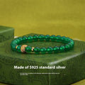 Green agate and sterling silver bracelet with yellow gold plating and 6mm geometry beads.