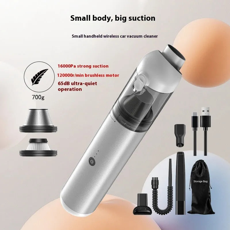 Black handheld wireless cleaner with attachments on a table, 70W rechargeable dust blower for car and home use