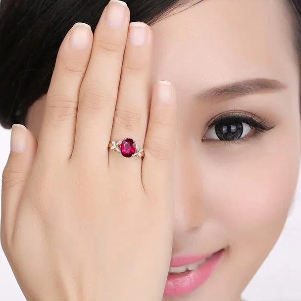 Women's copper butterfly and heart shape ring with 18k rose gold plating in red and blue colour options.