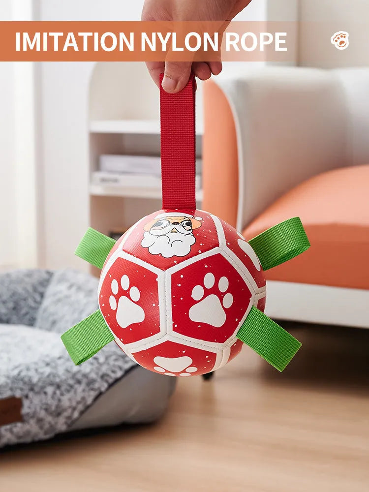 Dog soccer ball toy with straps in Christmas and Halloween colours for tug of war and water play