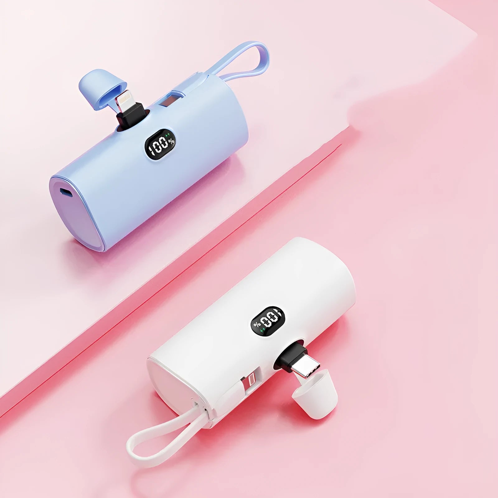 Compact capsule-shaped power bank with digital display and built-in plug in multiple colours.