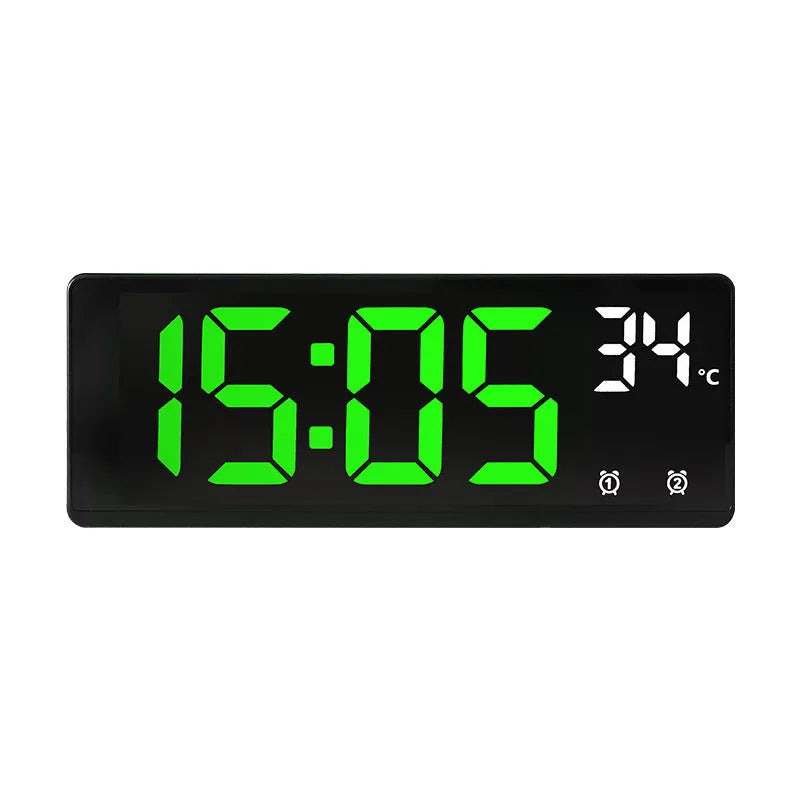 Large screen electronic LED alarm clock showing time and temperature, in a black acrylic casing.