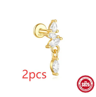 S925 sterling silver geometric star-shaped earrings with a moon and diamond detail in a gold tone.