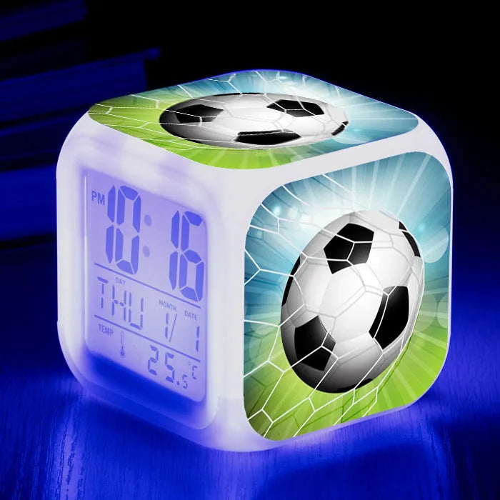 Square plastic alarm clock with football pattern design and silent alarm function for children's bedrooms