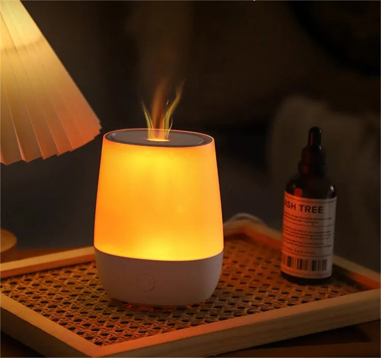 White Creative New Flame humidifier aromatherapy machine with simulated flame effect on a surface