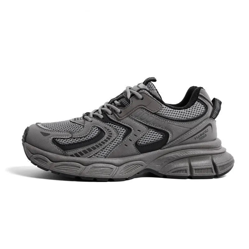 Men's gray platform casual sneakers with PU mesh upper and leather stitching details on a white background.
