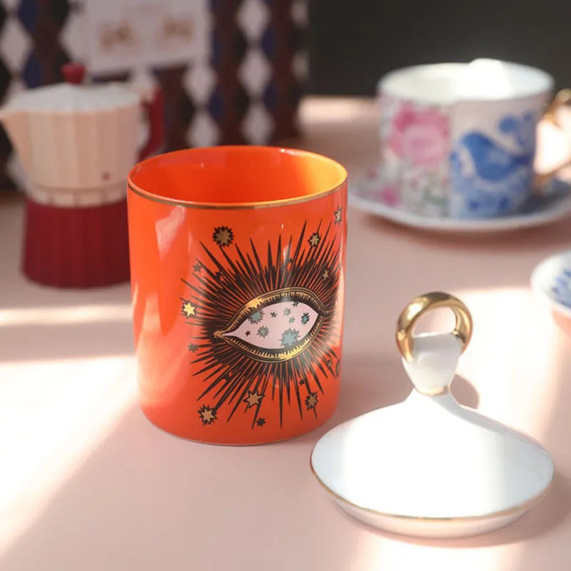 Ceramic Big Eyes candle holder with decal pattern in blue standing on a surface