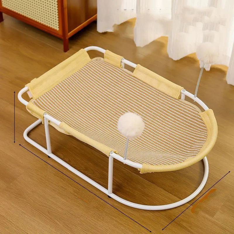Grey metal frame cat kennel with a soft breathable fabric bed elevated off the floor.