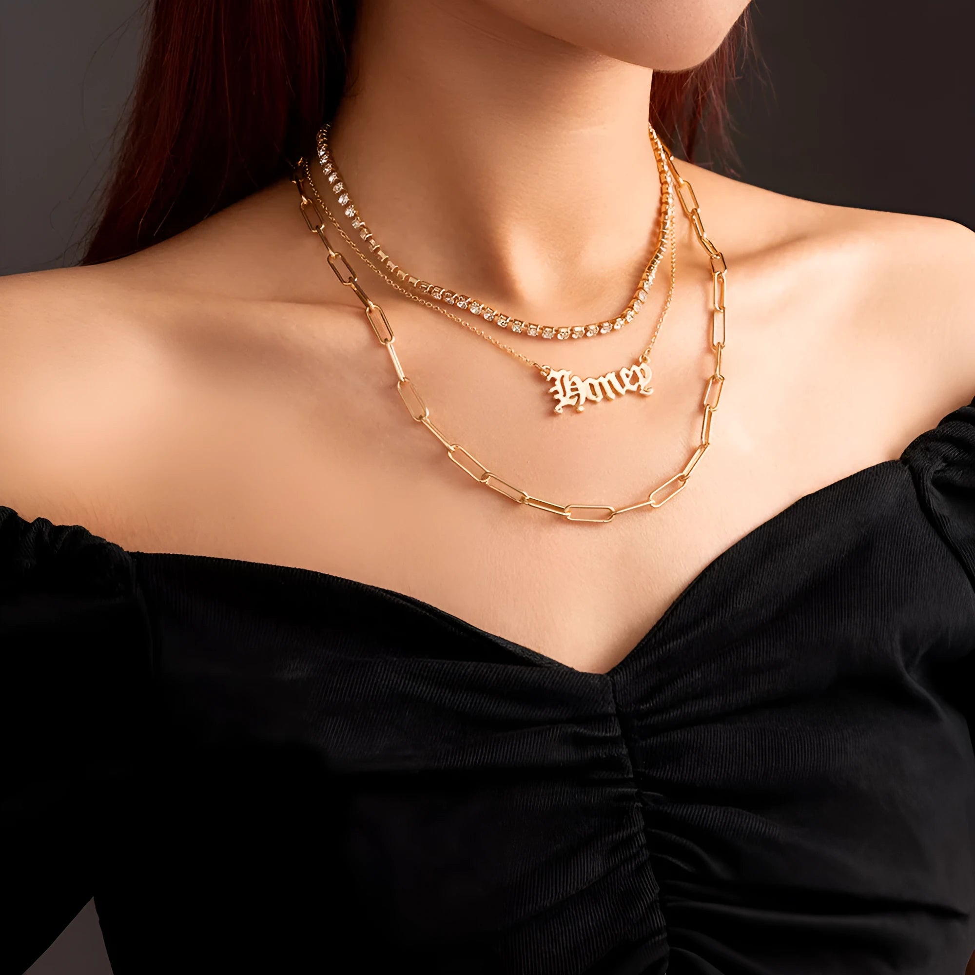Monogram pendant multi-layer necklace on display showing electroplated zinc alloy chain and personalised initial