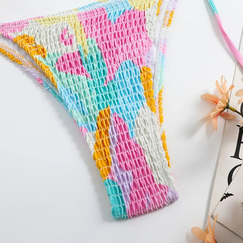 Multicolour floral gradient triangle bag bikini swimsuit with smocking detail for women.
