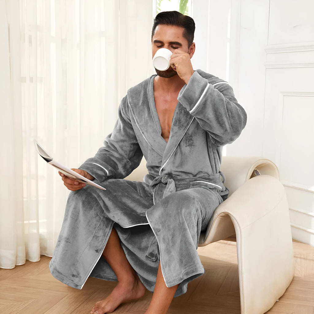 Men's grey flannel bathrobe with front tie belt, shown folded, for winter loungewear.
