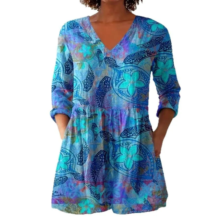 Women wearing a retro-style slim fit long-sleeved top with a digital print pattern.