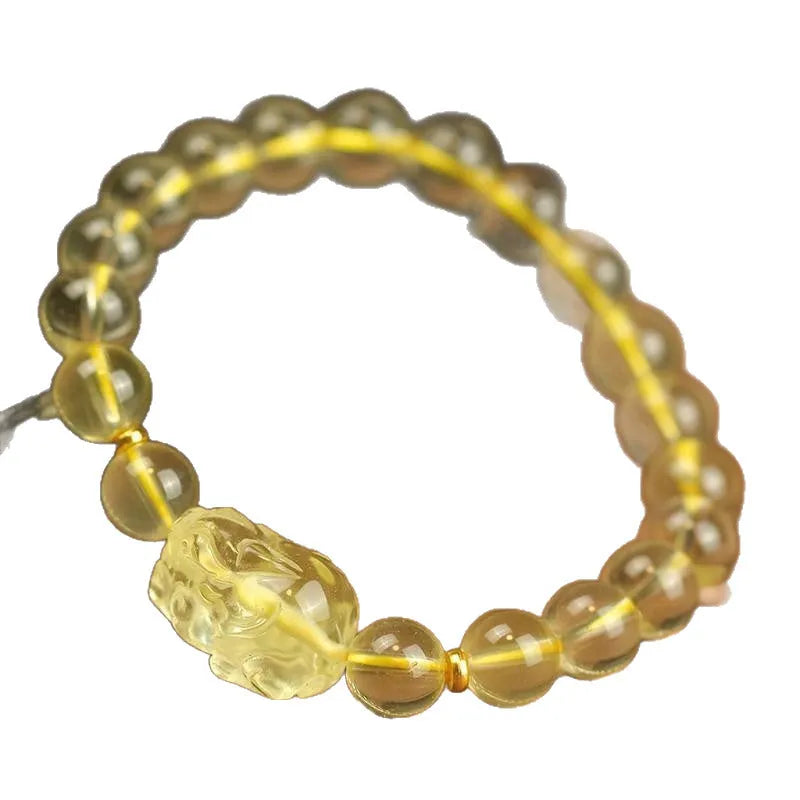 Yellow leather citrine pi xiu bracelet with artificial crystal bead in Chinese national style.